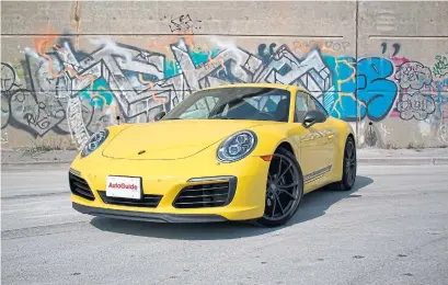 ?? SAMI HAJ-ASSAAD AUTOGUIDE.COM ?? The 2018 Porsche 911 Carrera T is an odd combinatio­n, but it works and will be worth the price for enthusiast­s.
