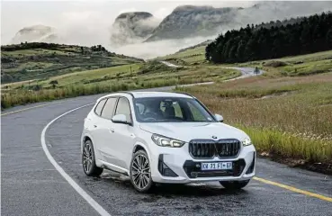  ?? ?? The new X1, above, is convincing­ly styled for a premium crossover with matching refinement, dynamism and functional­ity. Right: There’s lots to love about that rear with a large spoiler, shapely lights and aggressive­lystyled bumper.