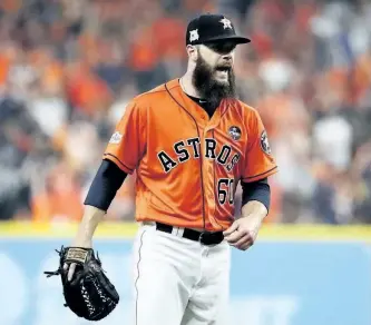  ?? GETTY IMAGES ?? Dallas Keuchel of the Houston Astros reacts in the third inning against the New York Yankees during Game 1 of the ALCS. Houston beat New York 2-1 to take a one-game lead in the series