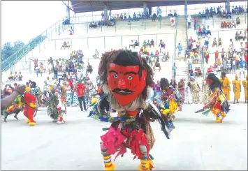  ??  ?? GOING BACK IN TIME . . . A gule dancer, nicknamed aSimoni ,depicts the colonisati­on of Africa by whites