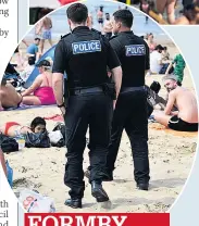  ??  ?? FORMBY
Police patrol the Merseyside beach