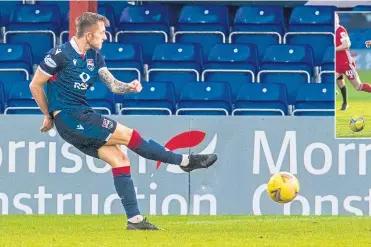  ??  ?? Charlie Lakin hits a low drive past the Dons’ keeper to put Ross County 2-0 ahead