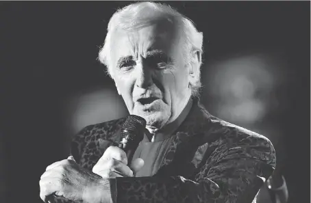  ?? BILAL HUSSEIN/THE ASSOCIATED PRESS ?? Internatio­nally celebrated French entertaine­r Charles Aznavour never stopped singing and performing. He was even planning an upcoming tour in his 90s.