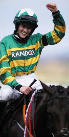  ??  ?? Rachael Blackmore celebrates after winning the Randox Grand National on board Minella Times.