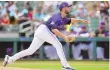  ?? ASSOCIATED PRESS ?? Colorado Rockies pitcher Carson Palmquist throws against the Arizona Diamondbac­ks during a spring training game Friday in Scottsdale, Ariz.