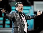 ??  ?? ETHAN MILLER/GETTY Juan Gabriel was Mexico’s leading singer-songwriter and top-selling artist. His hits included “Amor Eterno.”