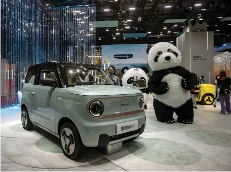  ?? Bloomberg ?? A Geely Panda Mini electric car at Shanghai Auto Show this week. China accounted for 60 per cent of 2022 electric car sales
