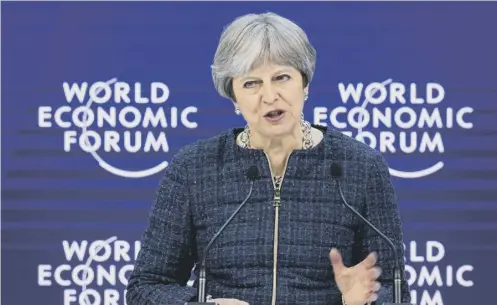  ?? PICTURE: AFP/GETTY IMAGES ?? 0 Prime Minister Theresa May spoke at the World Economic Forum in Davos yesterday