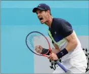  ?? ASSOCIATED PRESS ?? IN THIS JUNE 19 FILE PHOTO, Andy Murray of Britain celebrates winning a point after he plays a return to Nick Kyrgios of Australia during their singles tennis match at the Queen’s Club tennis tournament in London.