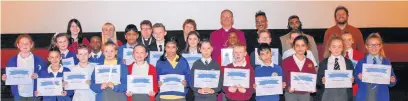  ??  ?? ●●Pupils who took part in the film and (above) the screening at the Odeon cinema