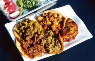  ?? Cesar Hernandez/The Chronicle ?? Tacos filled with stews from El Burro Veloz in Antioch. The restaurant offers eight varieties of guisado at a time.