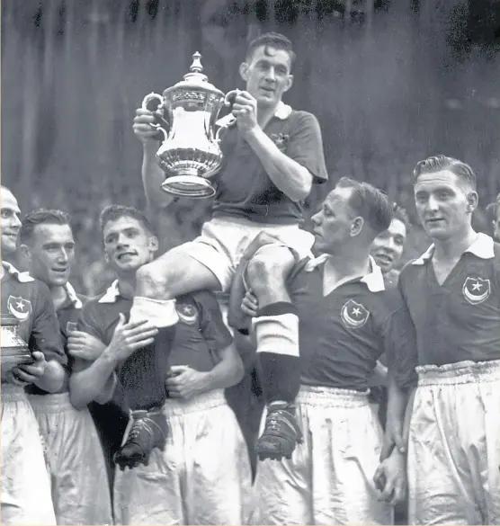  ?? Pictures: Getty. ?? Above: Jimmy Guthrie is held aloft by his team-mates at Wembley. Above right: George Formby with Jimmy and Blackpool captain James Blair at Fratton Park a week after the win.