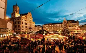  ?? Foto: Silvio Wyszengrad, zv ?? Budenzaube­r auf dem Rathauspla­tz: Auch heuer wird der Augsburger Christkind­lesmarkt wieder Besucher aus nah und fern verzaubern.