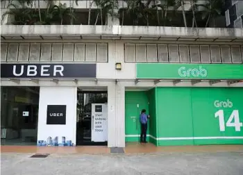  ?? PIC BLOOMBERG ?? Uber Technologi­es Inc sold its Southeast Asian business to bigger regional rival Grab earlier this year in exchange for a stake in the Singapore-based firm.