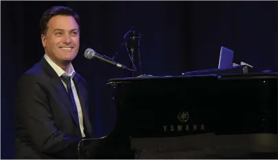  ?? RICK DIAMOND — GETTY IMAGES ?? Singer-songwriter Michael W. Smith performs at the Ryman Auditorium in Nashville in January 2015.