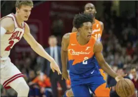  ?? PHIL LONG — THE ASSOCIATED PRESS ?? Collin Sexton drives past the Bulls’ Lauri Markkanen during the first half on Dec. 23.