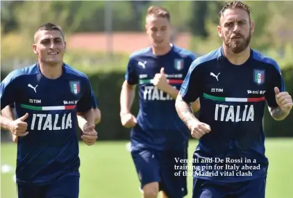  ??  ?? Verratti and De Rossi in a training pin for Italy ahead of the Madrid vital clash