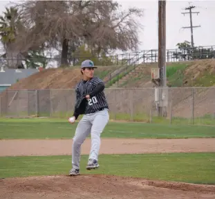  ?? Courtesy of Chris Pedigo ?? River Valley High’s Emilio Castaneda on the mound for the Falcons.