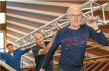  ?? JOHN HAWKINS/STUFF ?? Vision band members, from left, Warren Skerett, Tom Osmond and Dave Gillie set up the stage ahead of their 50th anniversar­y show in Invercargi­ll.