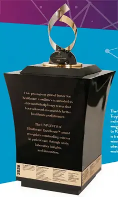  ?? ?? The GREAT Trophy is 50 inches tall and weighs close to 100 lbs. It is traveling to winning care sites across the world.