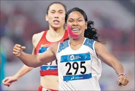  ?? REUTERS ?? India’s Swapna Barman celebrates after winning gold in women’s heptathlon at the Asian Games in Jakarta on Wednesday.