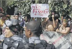  ??  ?? ‘they won’t pass’, says the sign outside the Maracana; the police moved in anyway and also arrested a number of sympathise­rs