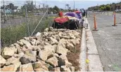  ?? GARY WARTH U-T ?? Large rocks were placed alongside South Oceanside Boulevard Wednesday.