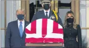  ?? J. SCOTT APPLEWHITE — THE ASSOCIATED PRESS ?? President Donald Trump and first lady Melania Trump pay respects as Justice Ruth Bader Ginsburg lies in repose at the Supreme Court building on Thursday. Ginsburg, 87, died of cancer on Sept. 18.