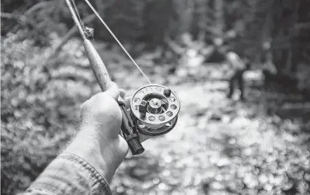  ?? CL MEDIA Dreamstime/TNS ?? A national program provides free fly-fishing retreats to empower breast cancer survivors.