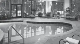  ??  ?? The heated indoor-outdoor pool is a highlight for kids and adults alike.