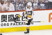  ?? Jason Halstead / Getty Images ?? Jonathan Marchessau­lt of the Golden Knights celebrates after scoring in the third period, his second goal of the game.