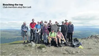  ??  ?? Reaching the top Club members atop Ben Ledi