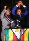  ?? The Associated Press ?? Zimbabwe’s president in waiting, Emmerson Mnangagwa, right, greets supporters gathered outside the ZANU-PF party headquarte­rs in Harare, Zimbabwe, Wednesday.