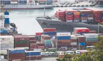  ?? JEROME FAVRE/BLOOMBERG FILES ?? Container ships sit docked in the Port of Keelung in Taiwan. The island has applied to join the Comprehens­ive and Progressiv­e Agreement for Trans-pacific Partnershi­p.