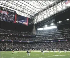  ?? AP PHOTO/MATT PATTERSON ?? The opening kickoff in a general stadium view during an NFL wild-card playoff football game, on Jan. 13 in Houston.