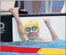  ?? AL BELLO — GETTY IMAGES ?? Australia’s Ariarne Titmus reacts after winning the women’s 200freesty­le, her second gold medal in the Tokyo Olympics.