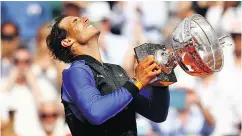  ?? CLIVE BRUNSKILL / GETTY IMAGES ?? In this French Open, Rafael Nadal dropped only 35 games, the second fewest by any man on the way to any title in the Open era, which dates to 1968.