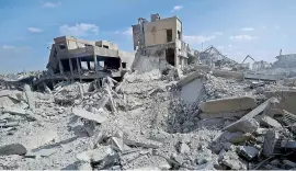  ?? — AP ?? The damaged Syrian Scientific Research Centre which was attacked by U.S., British and French military strikes in Barzeh, near Damascus on Saturday.