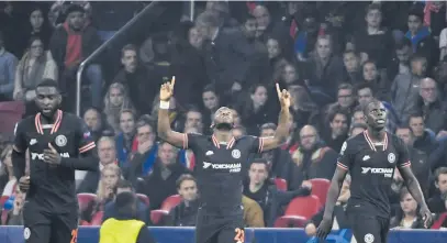  ?? Picture: AFP ?? YOUNG GUNS. Chelsea’s Belgian striker Michy Batshuayi (C) celebrates after scoring a goal during the Uefa Champions League Group H football match against Ajax Amsterdam yesterday in Amsterdam.