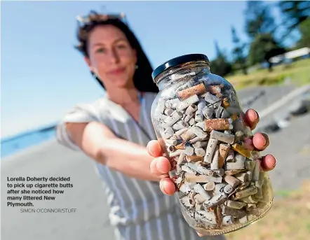  ?? SIMON O’CONNOR/STUFF ?? Lorella Doherty decided to pick up cigarette butts after she noticed how many littered New Plymouth.