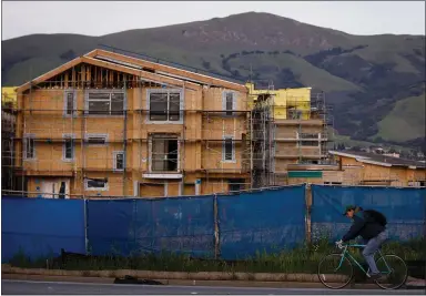  ?? STAFF FILE PHOTO ?? Constructi­on of a mixed-use residentia­l and business project is seen in Fremont last year. The Bay Area could be forming a new, regional authority tasked with shoring up the supply of affordable housing.