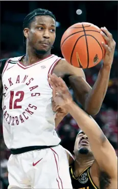  ?? (NWA Democrat-Gazette/Charlie Kaijo) ?? Arkansas’ Tramon Mark, a 6-6 junior guard who transferre­d from the University of Houston, is the Razorbacks’ scoring leader, averaging 16.8 points per game. “T-Mark is playing a little more point [guard] than he had earlier in the year,” Arkansas Coach Eric Musselman said.