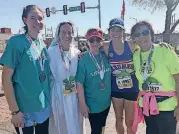  ?? [PHOTO PROVIDED] ?? Sister Maria Faulkner, founder of the Gospel of Life Dwellings, poses for a picture with friends after participat­ing in the 2018 Oklahoma City Memorial half-marathon.