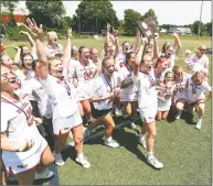  ?? Arnold Gold / Hearst Connecticu­t Media ?? New Canaan celebrates its 19-7 victory over Ridgefield in the CIAC Class L Girls Lacrosse Finals at Jonathan Law High School in Milford on Saturday.