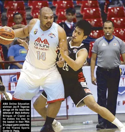  ??  ?? AMA Online Education slotman Jay- R Taganas shrugs off the leech-like defense of Mark Anthony Bringas of Cignal as he makes his way to the basket in their PBA D-League game yesterday at the Ynares Sports Center in Pasig.