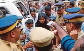  ?? REUTERS PIC ?? Akhila Ashokan, 25, whose marriage to a Muslim was annulled at her Hindu father’s request, arriving in Kochi, India, on Saturday. She will give her testimony to the Supreme Court today.