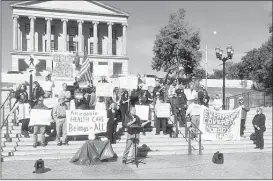  ?? RiChARD LoCkeR/ The CommeRCiCi­AL AppeAL ?? mike Adcox of hermitage, Tennessee, spoke monday at a rally at the state Capitol to encourage Gov. Bill haslam and the state legislatur­e to expand medicaid in the state.