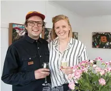  ?? PHOTO: KEVIN FARMER ?? NEW SHOW: Exhibiting artist Ian McCallum enjoys the exhibition opening with gallery director Alexandra Lawson.