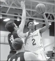  ?? NWA Democrat-Gazette/CHARLIE KAIJO ?? Bryant’s Khalen Robinson (2) puts up a shot in front of Bentonvill­e’s Thane Spencer (left) and Brayden Freeman during the Hornets’ victory over the Tigers on Saturday in the boys semifinals of the Class 6A state tournament in Centerton. Robinson led all scorers with 34 points.