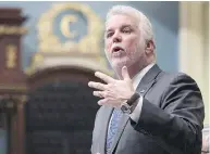  ?? JACQUES BOISSINOT / THE CANADIAN PRESS FILES ?? Quebec Premier Philippe Couillard says “the English language is not a foreign language in Quebec.”